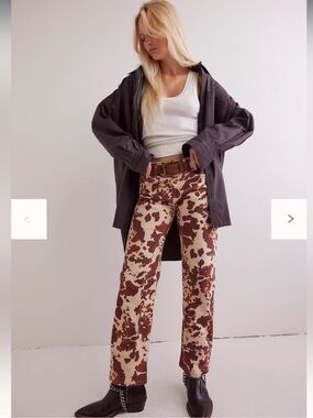 We The Free Cream and Brown Cow Print Wide Leg Jeans